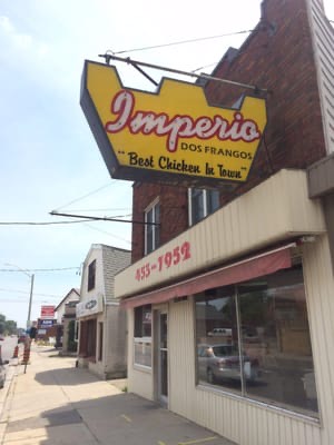 Imperio dos Frangos storefront and yellow chicken-shaped sign on Hamilton Road